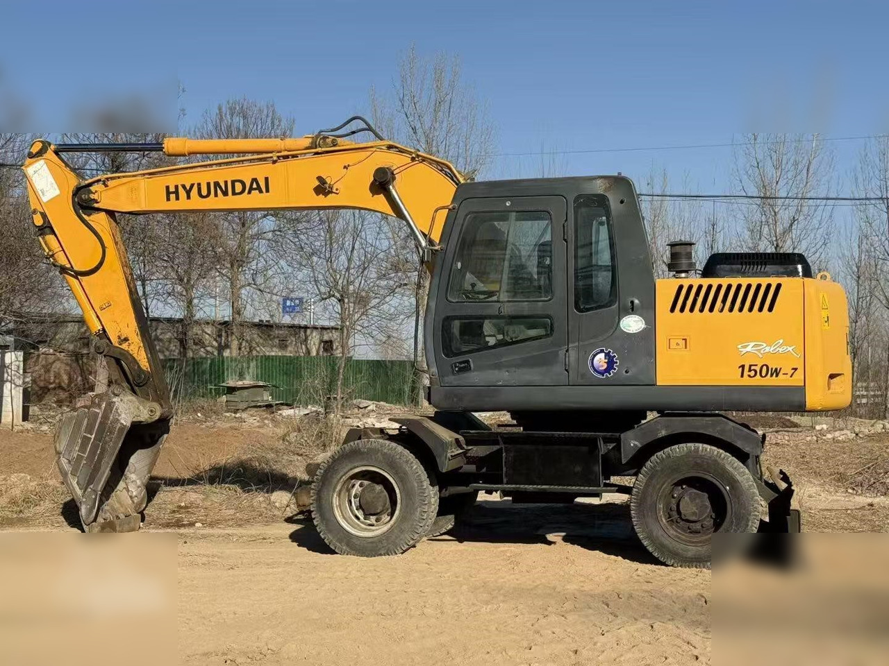 HYUNDAI ROBEX 150W-7A - Bager na kolesih: slika 1 HYUNDAI ROBEX 150W-7A - Bager na kolesih: slika 1