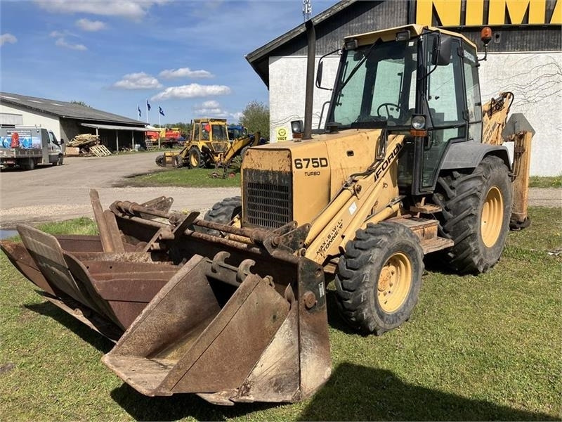 New Holland 675D - Bager nakladalec: slika 1 New Holland 675D - Bager nakladalec: slika 1