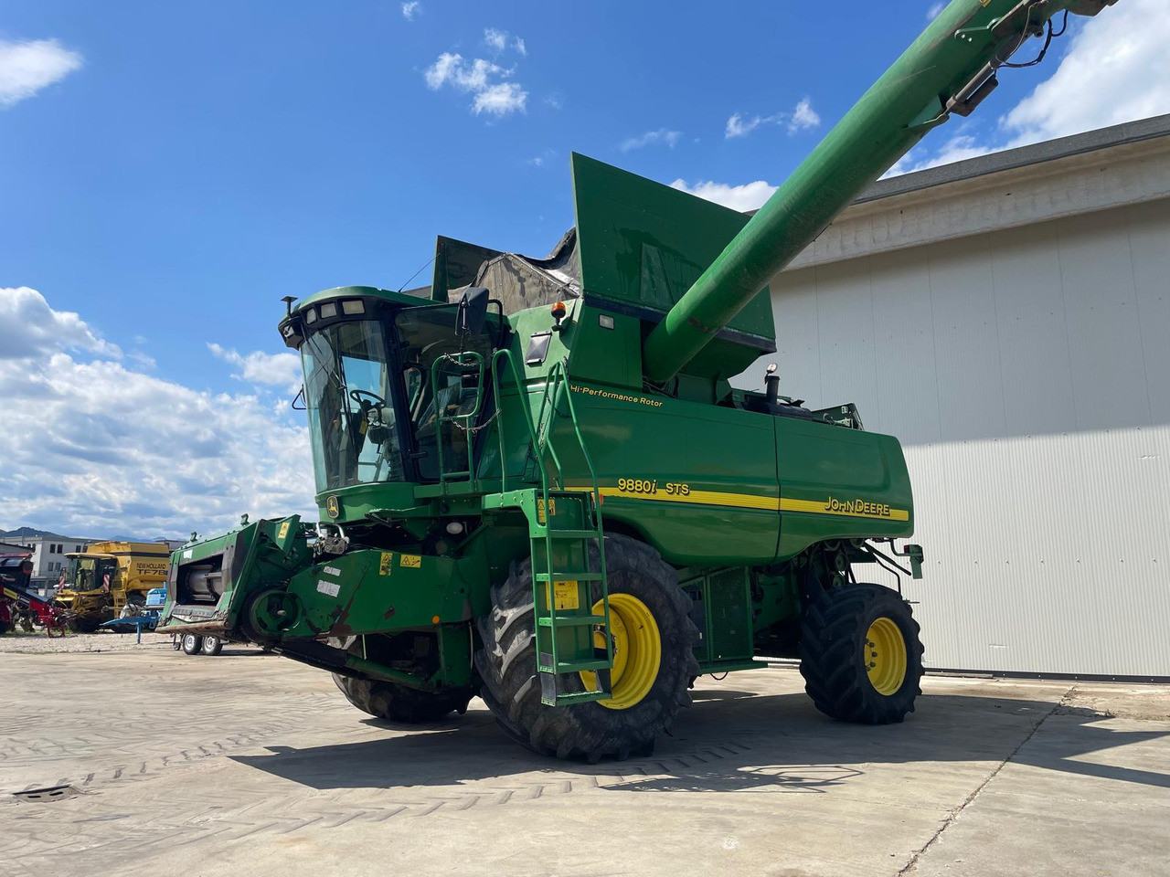 JOHN DEERE MIETITREBBIA STS 9880 - Kombajn harvester: slika 1 JOHN DEERE MIETITREBBIA STS 9880 - Kombajn harvester: slika 1