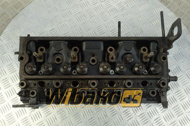 Cylinder head for engine Perkins 1004 3712H04A/8 - Glava motorja za Gradbeni stroj: slika 1 Cylinder head for engine Perkins 1004 3712H04A/8 - Glava motorja za Gradbeni stroj: slika 1