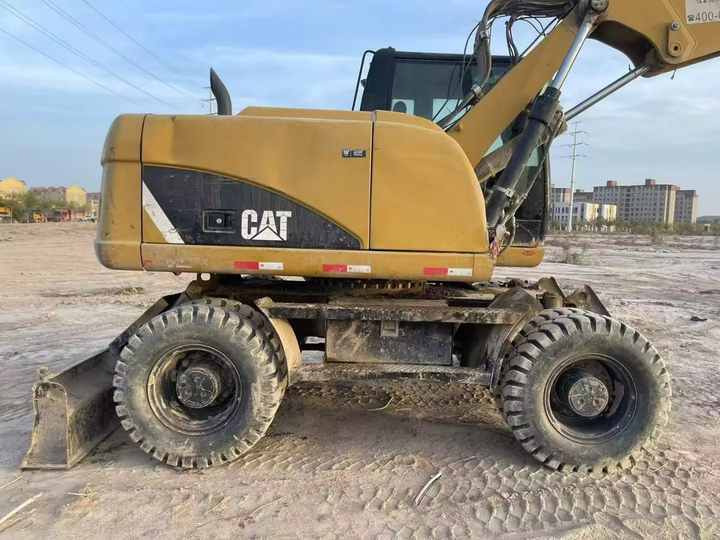 Used Digger Cat 315 Construction Machinery Construction Digger Used Cat 315 Cheap Excavator - Bager na kolesih: slika 3 Used Digger Cat 315 Construction Machinery Construction Digger Used Cat 315 Cheap Excavator - Bager na kolesih: slika 3