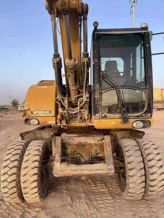 Used Digger Cat 315 Construction Machinery Construction Digger Used Cat 315 Cheap Excavator - Bager na kolesih: slika 2 Used Digger Cat 315 Construction Machinery Construction Digger Used Cat 315 Cheap Excavator - Bager na kolesih: slika 2