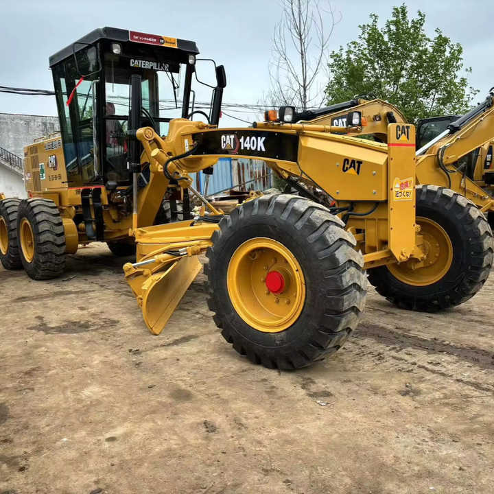 Used Cat 140K New Model Grader Popular Brand Japan Cat Hydraulic Machinery Construction Equipment - Greder: slika 1 Used Cat 140K New Model Grader Popular Brand Japan Cat Hydraulic Machinery Construction Equipment - Greder: slika 1