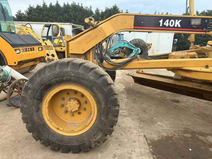 Used Caterpillar CAT 140k Land Road Motor Grader CAT140k Used Grader Cheap Price for Sale - Greder: slika 4 Used Caterpillar CAT 140k Land Road Motor Grader CAT140k Used Grader Cheap Price for Sale - Greder: slika 4