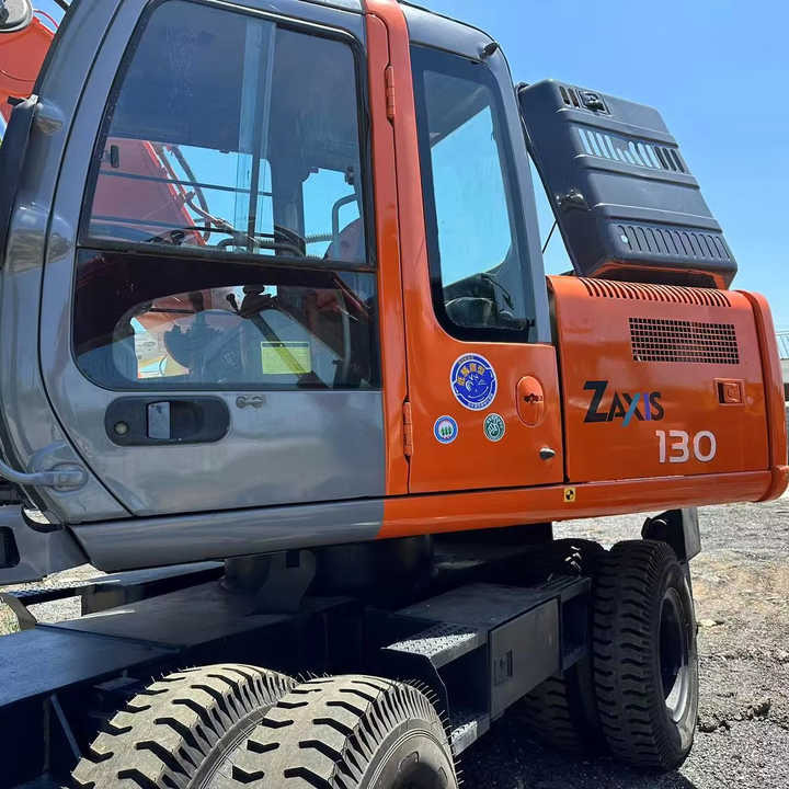 Used Wheel Excavator Hitachi ZX 130W Made in Japan 13ton Hitachi Zx130w Wheel Excavator Price Used Hitachi Zx130 Excavator SALE - Bager na kolesih: slika 1 Used Wheel Excavator Hitachi ZX 130W Made in Japan 13ton Hitachi Zx130w Wheel Excavator Price Used Hitachi Zx130 Excavator SALE - Bager na kolesih: slika 1
