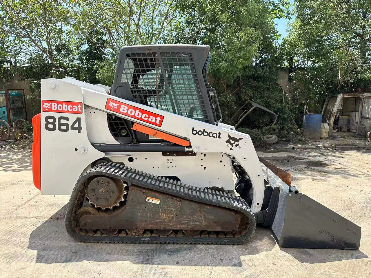 BOBCAT T864 - Mini nakladalec: slika 1 BOBCAT T864 - Mini nakladalec: slika 1
