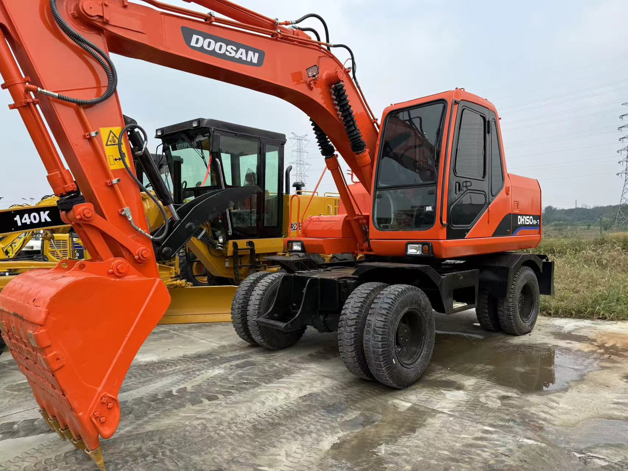DOOSAN DH150W-7 - Bager na kolesih: slika 1 DOOSAN DH150W-7 - Bager na kolesih: slika 1