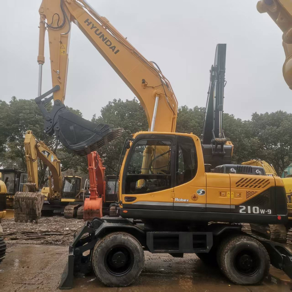 HYUNDAI R210W-9 - Bager na kolesih: slika 4 HYUNDAI R210W-9 - Bager na kolesih: slika 4