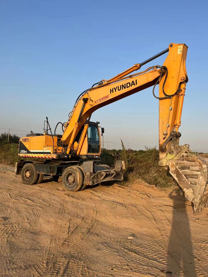 HYUNDAI R210W-9 - Bager na kolesih: slika 4 HYUNDAI R210W-9 - Bager na kolesih: slika 4