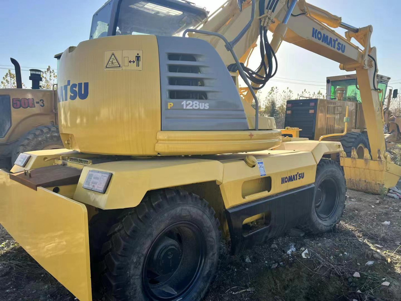 KOMATSU PC128US - Bager na kolesih: slika 2 KOMATSU PC128US - Bager na kolesih: slika 2