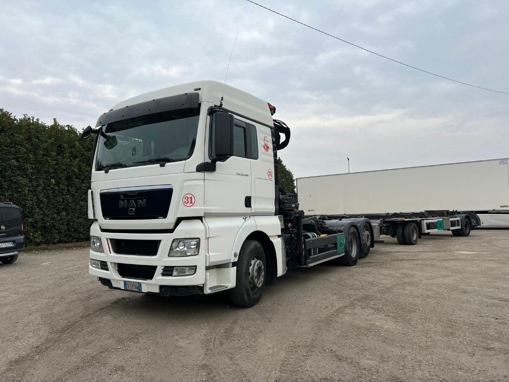 MAN TGX 26.480 SCARRABILE CON GRU - Kotalni prekucni tovornjak: slika 1 MAN TGX 26.480 SCARRABILE CON GRU - Kotalni prekucni tovornjak: slika 1