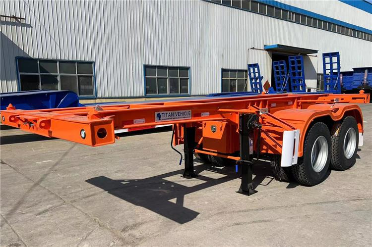 TITAN 2 Axle 20ft Container Chassis Trailer for Sale In Jamaica - Polprikolica šasija: slika 1 TITAN 2 Axle 20ft Container Chassis Trailer for Sale In Jamaica - Polprikolica šasija: slika 1