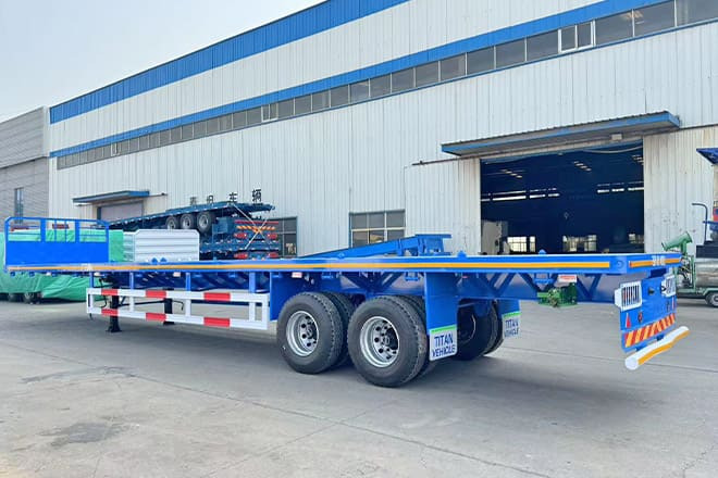 TITAN 2 Axle 45 Ft Flatbed Trailers for Sale in Algeria - Polprikolica s kesonom: slika 1 TITAN 2 Axle 45 Ft Flatbed Trailers for Sale in Algeria - Polprikolica s kesonom: slika 1