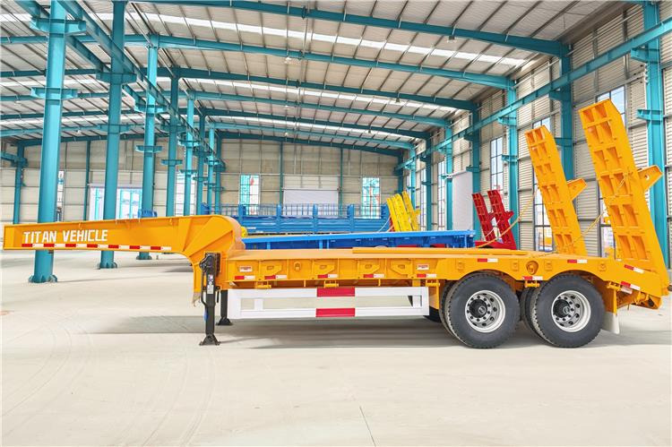 TITAN 2 Axle Low Loader Truck Trailer for Sale In Uganda - Nizko noseča polprikolica: slika 2 TITAN 2 Axle Low Loader Truck Trailer for Sale In Uganda - Nizko noseča polprikolica: slika 2