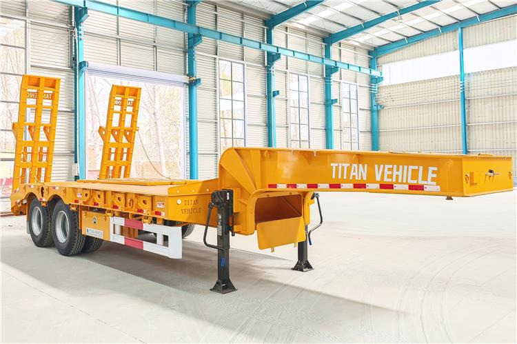 TITAN 2 Axle Low Loader Truck Trailer for Sale In Uganda - Nizko noseča polprikolica: slika 1 TITAN 2 Axle Low Loader Truck Trailer for Sale In Uganda - Nizko noseča polprikolica: slika 1