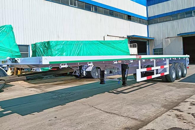 TITAN 3 Axle 40 Ft Flatbed Trailer for Sale in Mauritania - Polprikolica s kesonom: slika 3 TITAN 3 Axle 40 Ft Flatbed Trailer for Sale in Mauritania - Polprikolica s kesonom: slika 3
