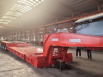 TITAN 4 Axle 100 Ton Lowboy Trailer for Sale in Zambia - Nizko noseča polprikolica: slika 2 TITAN 4 Axle 100 Ton Lowboy Trailer for Sale in Zambia - Nizko noseča polprikolica: slika 2