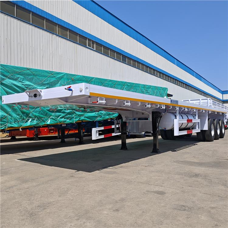 TITAN 40ft Tri Axle Flatbed Semi Trailer for Sale Price In Nigeria Lagos - Kontejnerska polprikolica/ Polprikolica z zamenljivim tovoriščem: slika 1 TITAN 40ft Tri Axle Flatbed Semi Trailer for Sale Price In Nigeria Lagos - Kontejnerska polprikolica/ Polprikolica z zamenljivim tovoriščem: slika 1