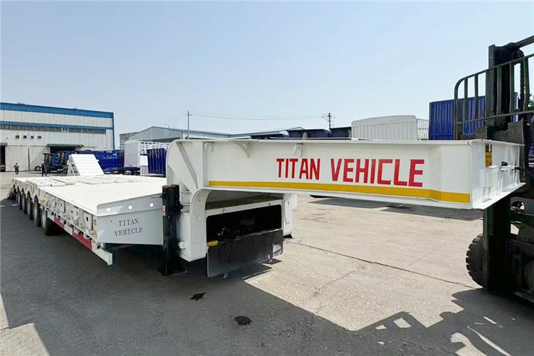 TITAN 5 Axle 100 Ton Low Bed Trailer for Sale In Tanzania - Nizko noseča polprikolica: slika 5 TITAN 5 Axle 100 Ton Low Bed Trailer for Sale In Tanzania - Nizko noseča polprikolica: slika 5