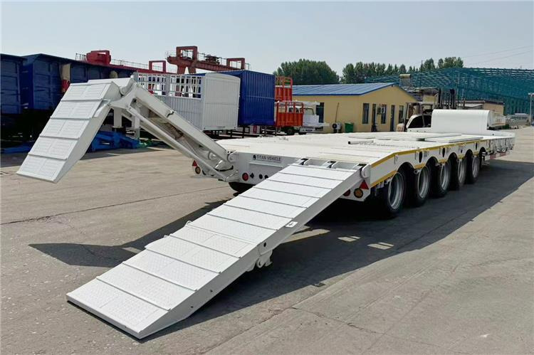 TITAN 5 Axle 100 Ton Low Bed Trailer for Sale In Tanzania - Nizko noseča polprikolica: slika 2 TITAN 5 Axle 100 Ton Low Bed Trailer for Sale In Tanzania - Nizko noseča polprikolica: slika 2