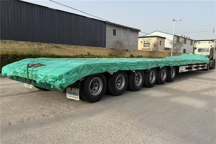 TITAN 6 Axle 80 Ton Low Loader Semi Trailer for Sale In Zambia - Nizko noseča polprikolica: slika 2 TITAN 6 Axle 80 Ton Low Loader Semi Trailer for Sale In Zambia - Nizko noseča polprikolica: slika 2