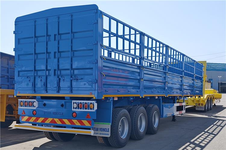 TITAN 60 Ton Fence Cargo Semi Trailer for Sale in Tanzania - Polprikolica za prevoz živine: slika 1 TITAN 60 Ton Fence Cargo Semi Trailer for Sale in Tanzania - Polprikolica za prevoz živine: slika 1