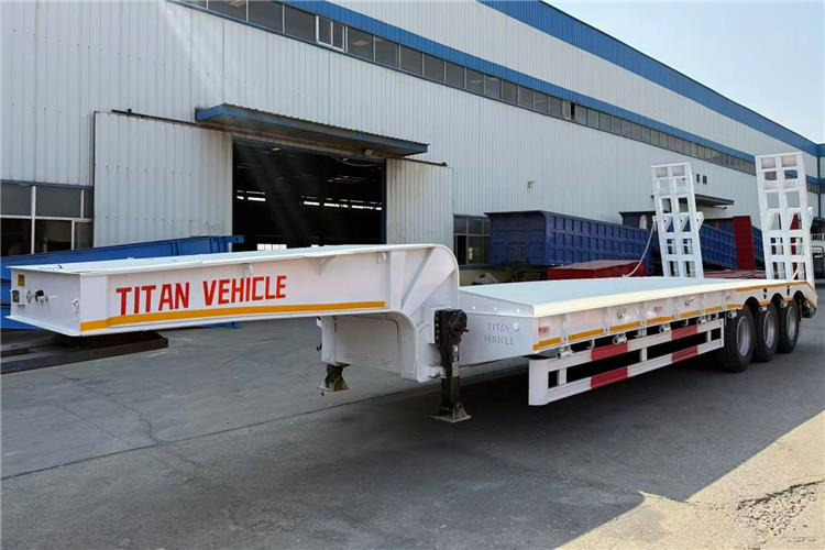 TITAN 60 Ton Low Bed Trailer for Sale In Tananiza - Nizko noseča polprikolica: slika 1 TITAN 60 Ton Low Bed Trailer for Sale In Tananiza - Nizko noseča polprikolica: slika 1