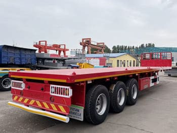TITAN Flatbed Tri Axle Truck Trailer for Sale in Tanzania - Polprikolica s kesonom: slika 2 TITAN Flatbed Tri Axle Truck Trailer for Sale in Tanzania - Polprikolica s kesonom: slika 2