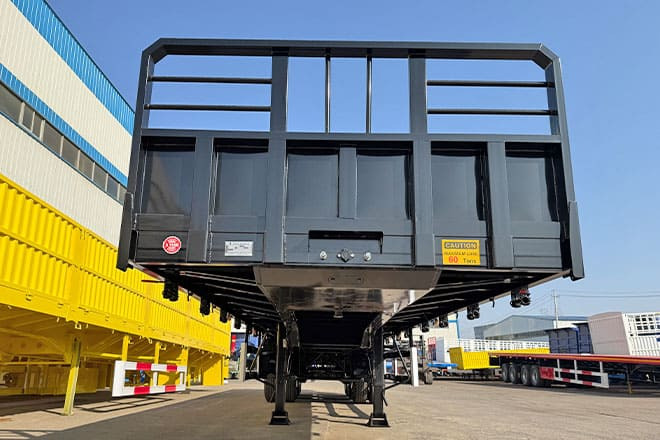 TITAN Tri Axle Flatbed Trailer for Sale in Jamaica - Polprikolica s kesonom: slika 3 TITAN Tri Axle Flatbed Trailer for Sale in Jamaica - Polprikolica s kesonom: slika 3