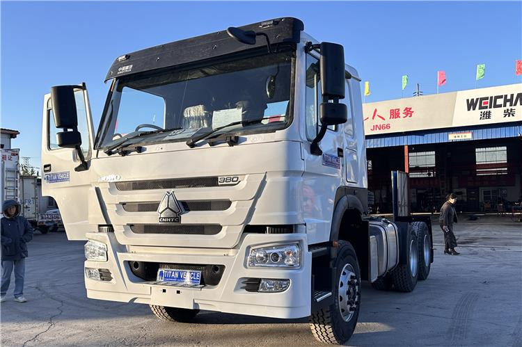 Sinotruk Used Howo 380HP Truck Head with RHD for Sale In Tanzania - Vlačilec: slika 1 Sinotruk Used Howo 380HP Truck Head with RHD for Sale In Tanzania - Vlačilec: slika 1