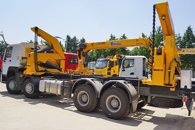 XCMG 20Ft Container Side Lift Truck for Sale in Guyana - Kontejnerski tovornjak/ Tovornjak z zamenljivim tovoriščem: slika 1 XCMG 20Ft Container Side Lift Truck for Sale in Guyana - Kontejnerski tovornjak/ Tovornjak z zamenljivim tovoriščem: slika 1
