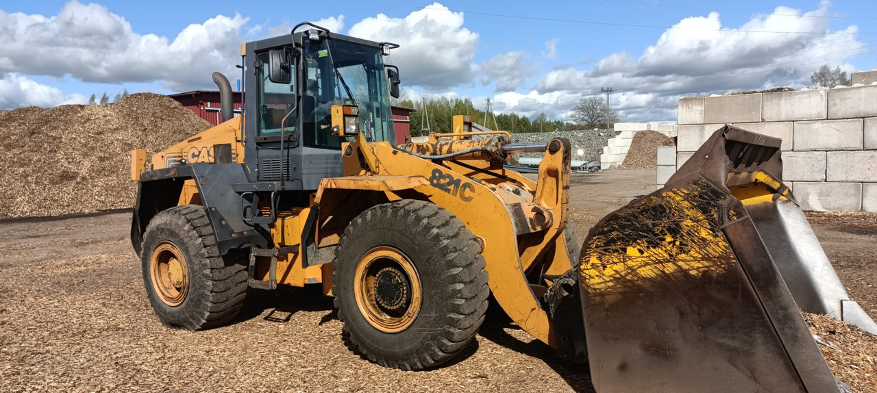 CASAE 812C - Kolesni nakladalec: slika 1 CASAE 812C - Kolesni nakladalec: slika 1