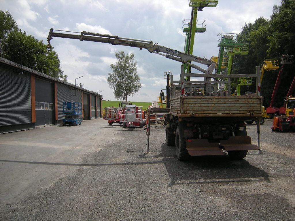 Mercedes-Benz Unimog U1250 mit Kran MKG 105 - Dostavno vozilo prekucnik: slika 4 Mercedes-Benz Unimog U1250 mit Kran MKG 105 - Dostavno vozilo prekucnik: slika 4