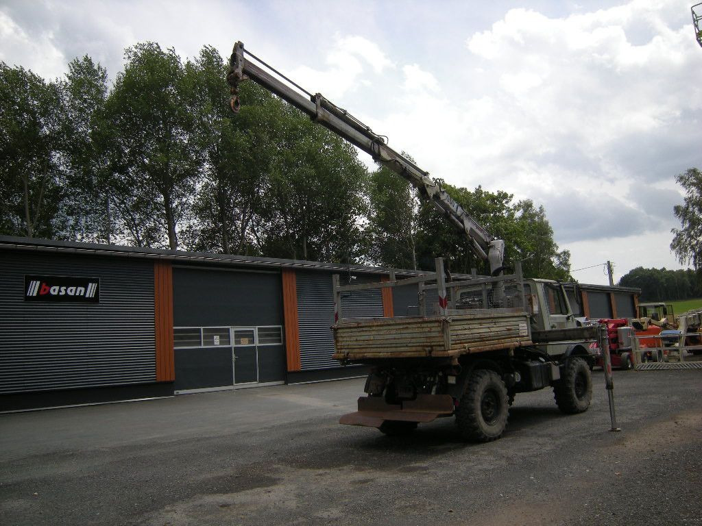 Mercedes-Benz Unimog U1250 mit Kran MKG 105 - Dostavno vozilo prekucnik: slika 2 Mercedes-Benz Unimog U1250 mit Kran MKG 105 - Dostavno vozilo prekucnik: slika 2