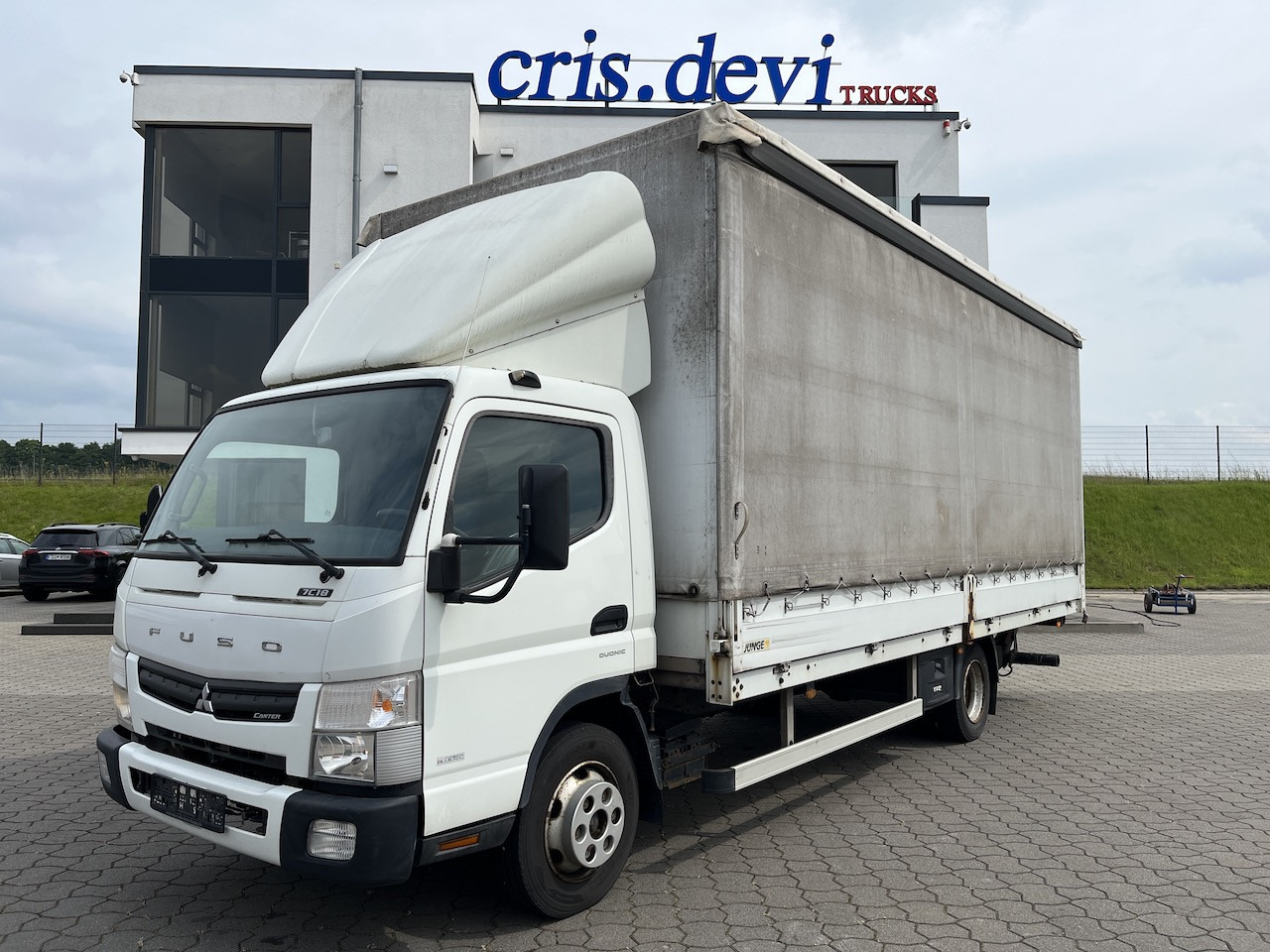 FUSO Canter 7C18 4x2 Ladebordwand Getriebeschaden - Dostavno vozilo s ponjavo: slika 1 FUSO Canter 7C18 4x2 Ladebordwand Getriebeschaden - Dostavno vozilo s ponjavo: slika 1