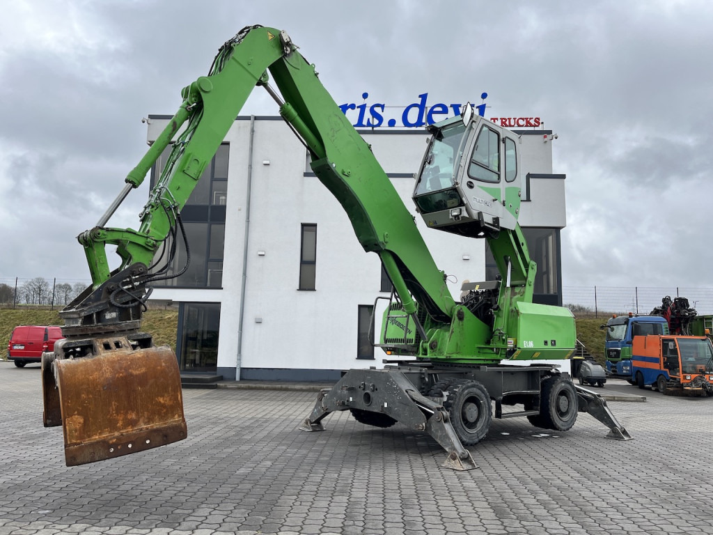 Sennebogen 818 Umschlagbagger Greifer - Bager na kolesih: slika 1 Sennebogen 818 Umschlagbagger Greifer - Bager na kolesih: slika 1