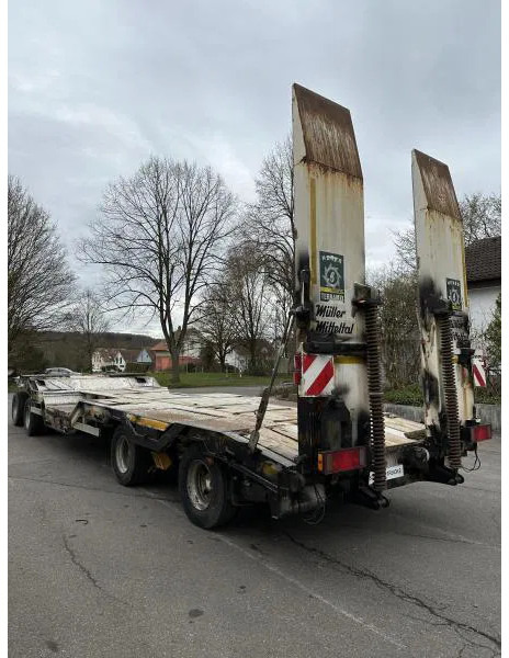 Müller-Mitteltal T4 4-Achs Tieflader Radmulden luftgefedert T4 4-Achs Tieflader Radmulden luftgefedert - Nizko noseča prikolica: slika 5 Müller-Mitteltal T4 4-Achs Tieflader Radmulden luftgefedert T4 4-Achs Tieflader Radmulden luftgefedert - Nizko noseča prikolica: slika 5
