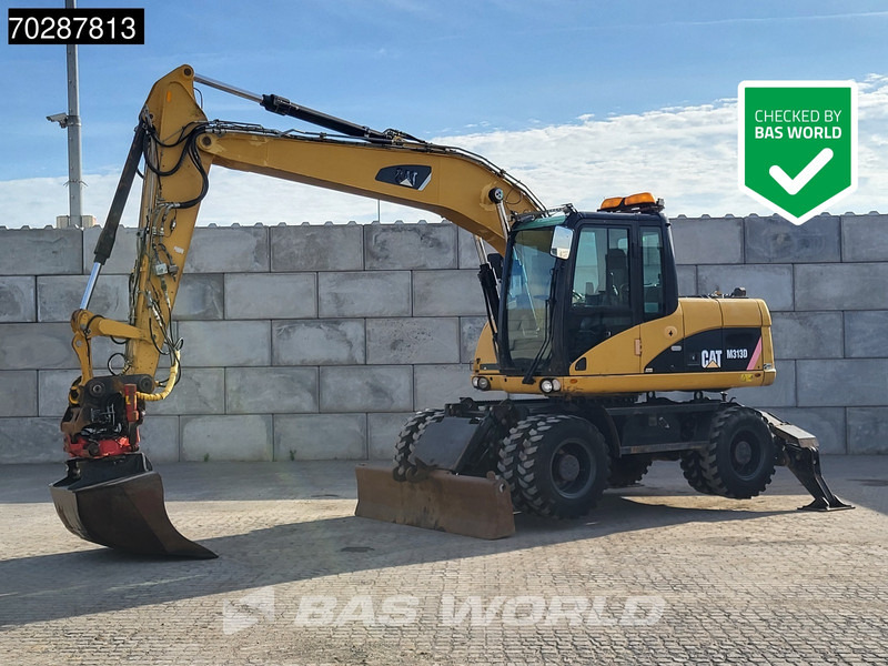 Caterpillar M313 D OUTRIGGERS + BLADE - Bager na kolesih: slika 1 Caterpillar M313 D OUTRIGGERS + BLADE - Bager na kolesih: slika 1