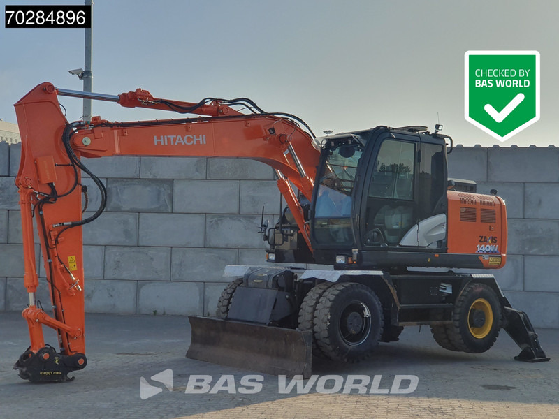 Hitachi ZX140W -6 OUTRIGGERS + BLADE - Bager na kolesih: slika 1 Hitachi ZX140W -6 OUTRIGGERS + BLADE - Bager na kolesih: slika 1