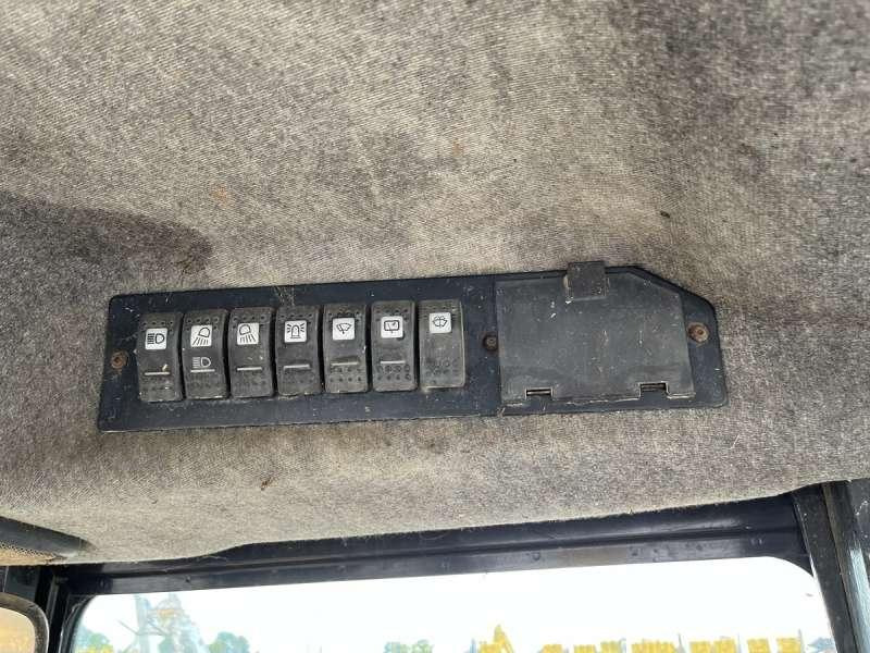 Bager nakladalec Caterpillar 428C: slika 43