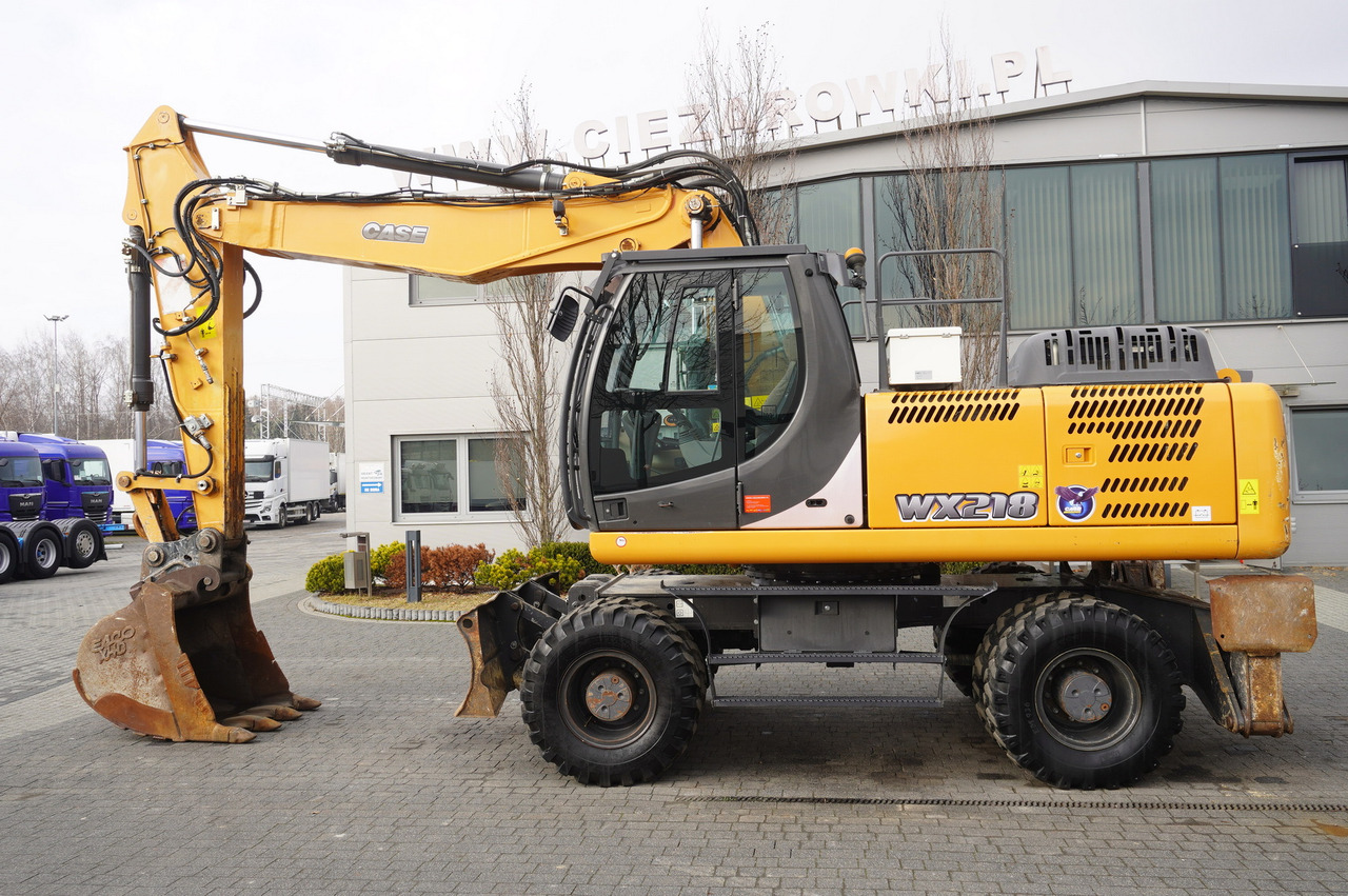 CASE WX218 / 23t wheeled excavator / 3 times folding arm - Bager na kolesih: slika 1 CASE WX218 / 23t wheeled excavator / 3 times folding arm - Bager na kolesih: slika 1