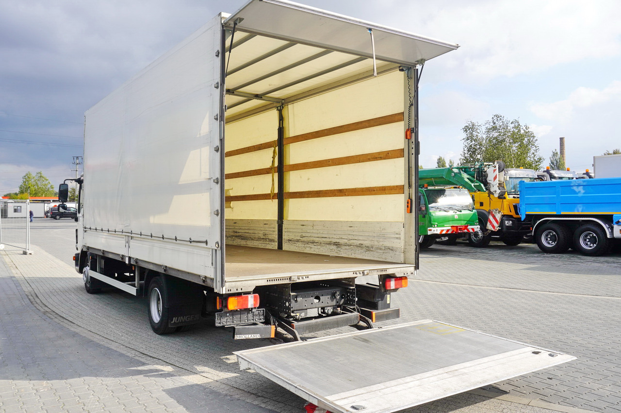 JUNGE Tarpaulin body + lift Dhollandia 1000 kg - Zamenljivo tovorišče s ponjavo: slika 1 JUNGE Tarpaulin body + lift Dhollandia 1000 kg - Zamenljivo tovorišče s ponjavo: slika 1