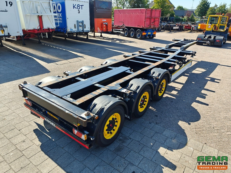 Kögel PORT 40 SIMPLEX 20 3-Assen SAF - Schijfremmen - 20/30/40FT Aansluiting - Achterschuiver - Kontejnerska polprikolica/ Polprikolica z zamenljivim tovoriščem: slika 4 Kögel PORT 40 SIMPLEX 20 3-Assen SAF - Schijfremmen - 20/30/40FT Aansluiting - Achterschuiver - Kontejnerska polprikolica/ Polprikolica z zamenljivim tovoriščem: slika 4