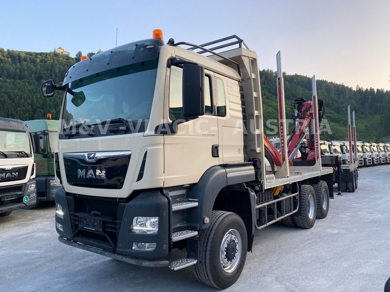 MAN 33.500 6X6 mit Kran PENZ 12Z - Tovornjak za prevoz lesa, Tovornjak z dvigalom: slika 1 MAN 33.500 6X6 mit Kran PENZ 12Z - Tovornjak za prevoz lesa, Tovornjak z dvigalom: slika 1
