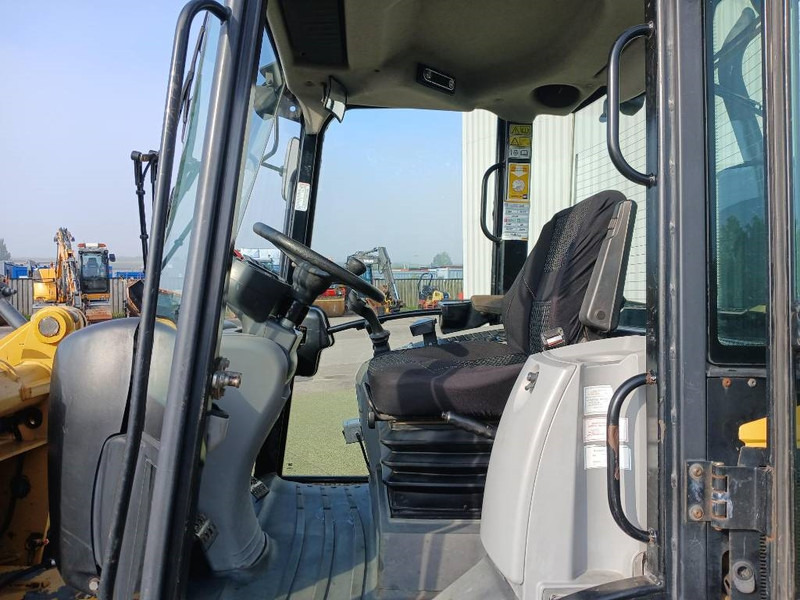 Kolesni nakladalec Cat 906H, Hjullastare: slika 10