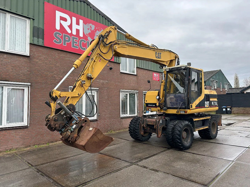 Caterpillar M315 +ROTO CE - Bager na kolesih: slika 2 Caterpillar M315 +ROTO CE - Bager na kolesih: slika 2