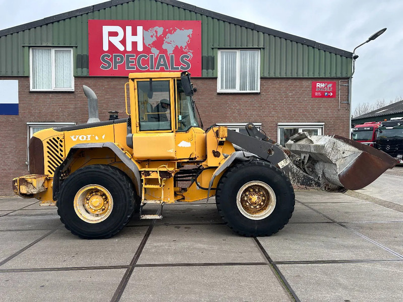 Volvo L60E - Kolesni nakladalec: slika 1 Volvo L60E - Kolesni nakladalec: slika 1