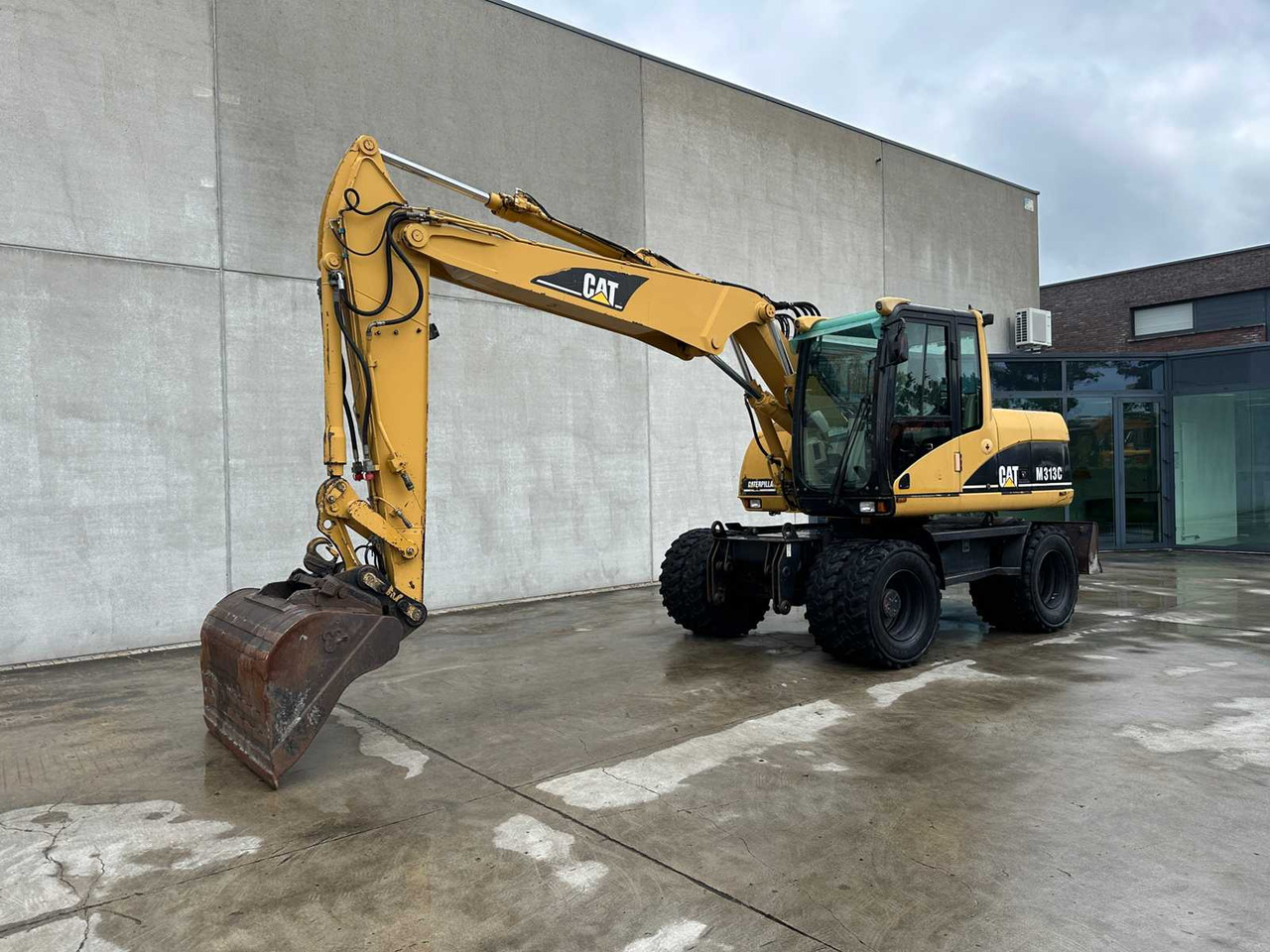 Caterpillar M313C - Bager na kolesih: slika 1 Caterpillar M313C - Bager na kolesih: slika 1