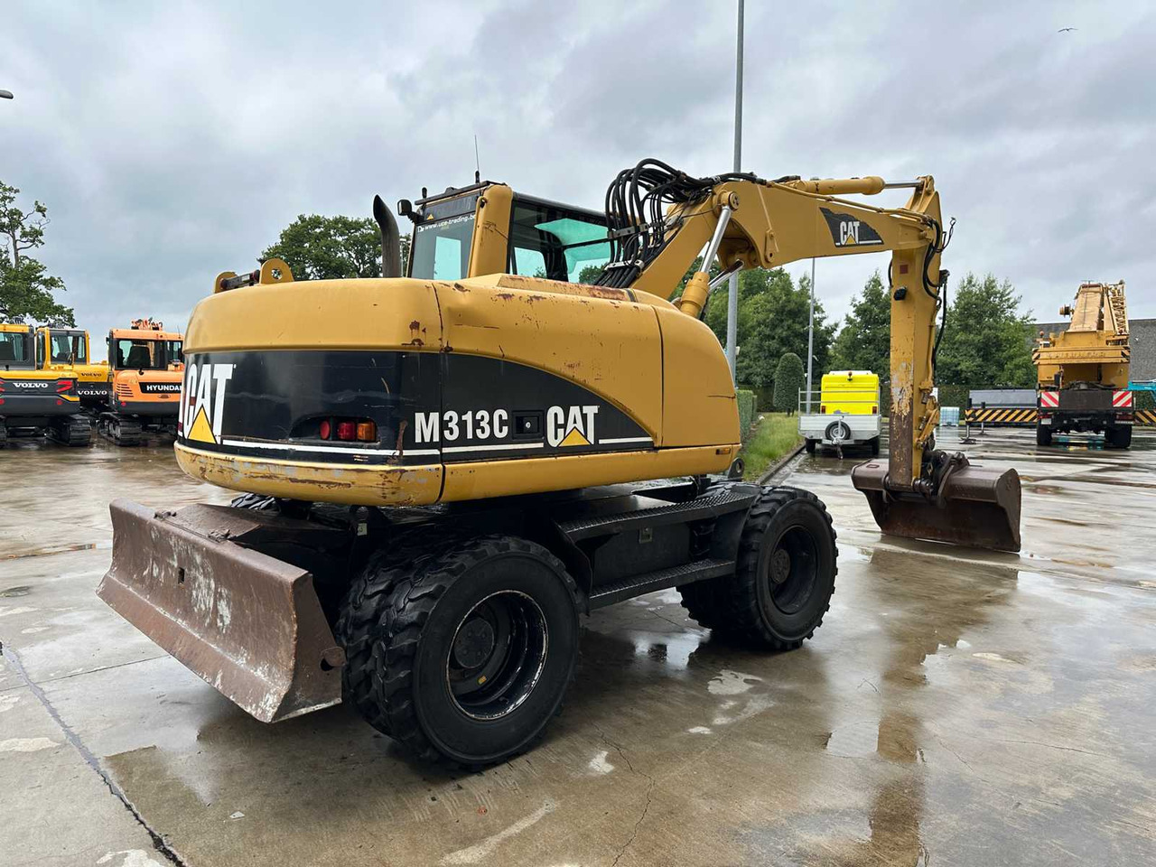 Caterpillar M313C - Bager na kolesih: slika 4 Caterpillar M313C - Bager na kolesih: slika 4