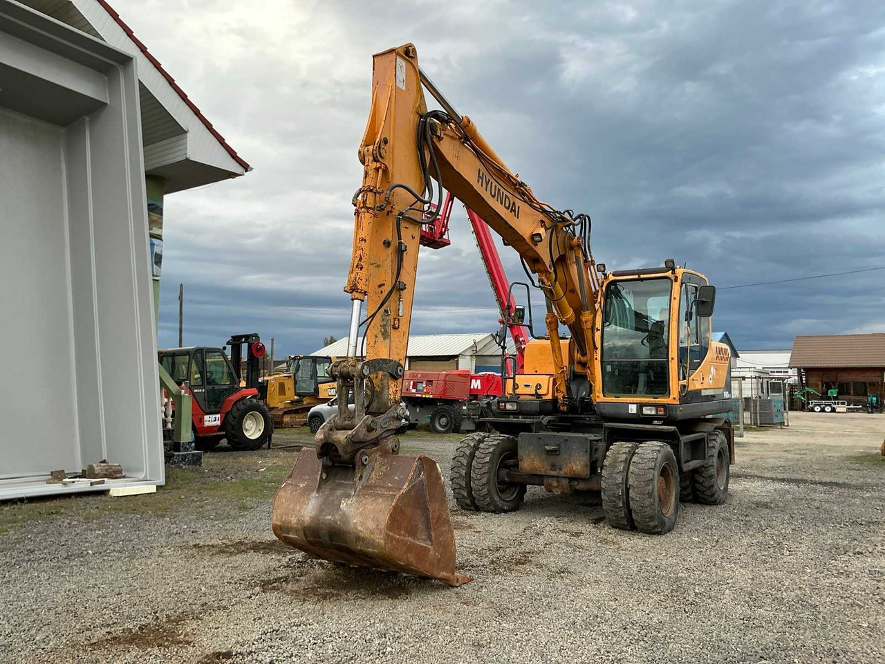 HYUNDAI - ROBEX 140W-9 - WHEELED EXCAVATOR - 2010 - Bager na kolesih: slika 3 HYUNDAI - ROBEX 140W-9 - WHEELED EXCAVATOR - 2010 - Bager na kolesih: slika 3
